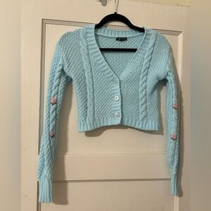 Cropped knitted cardigan
